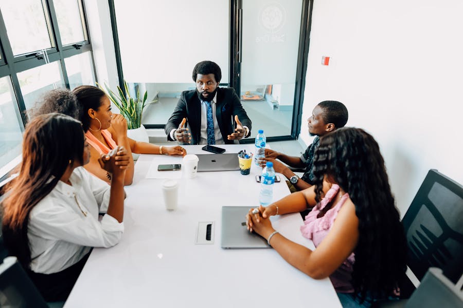 Lagos business team planning around a conference table